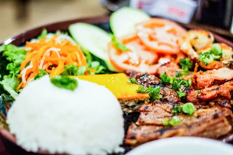 Com tam broken rice with grilled pork and pickles
