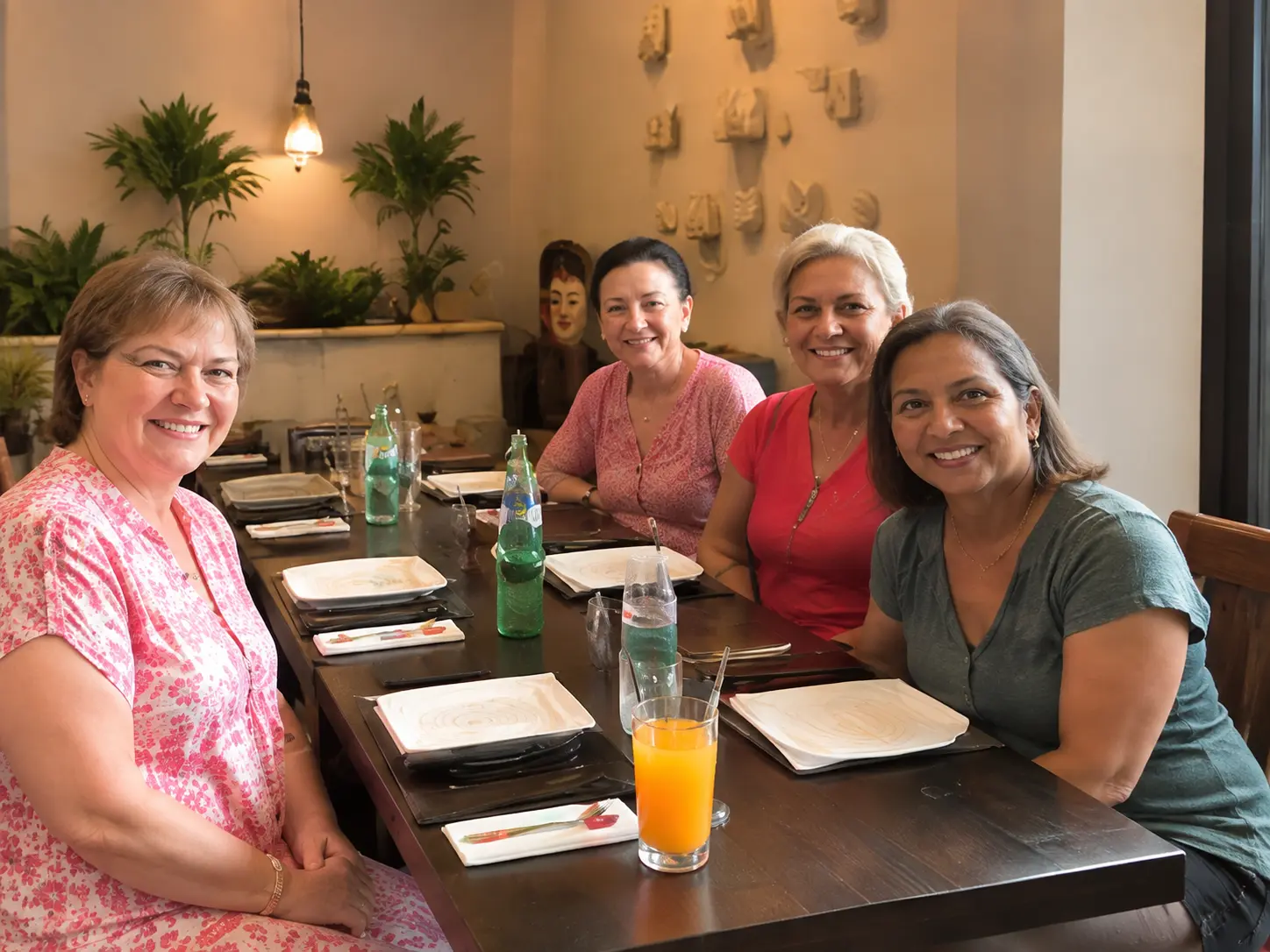 A small group of women sharing a meal together