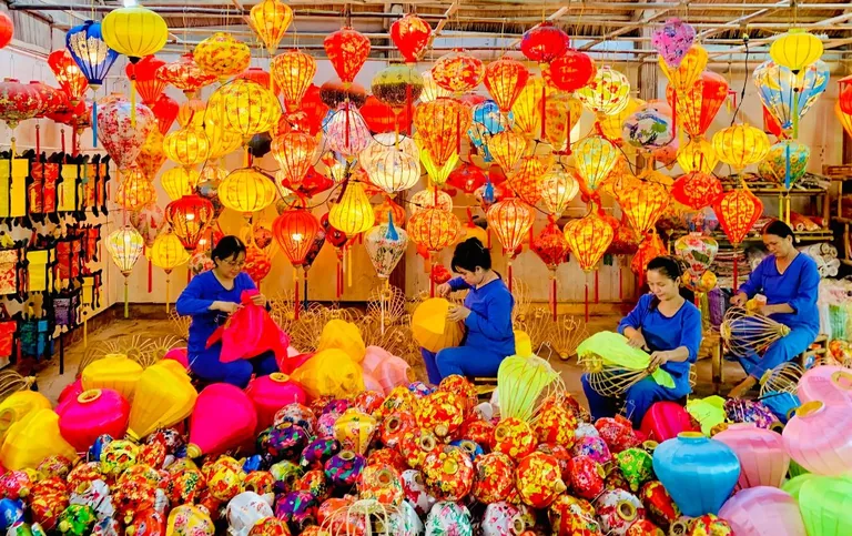 Artisans making silk lanterns in Hoi An
