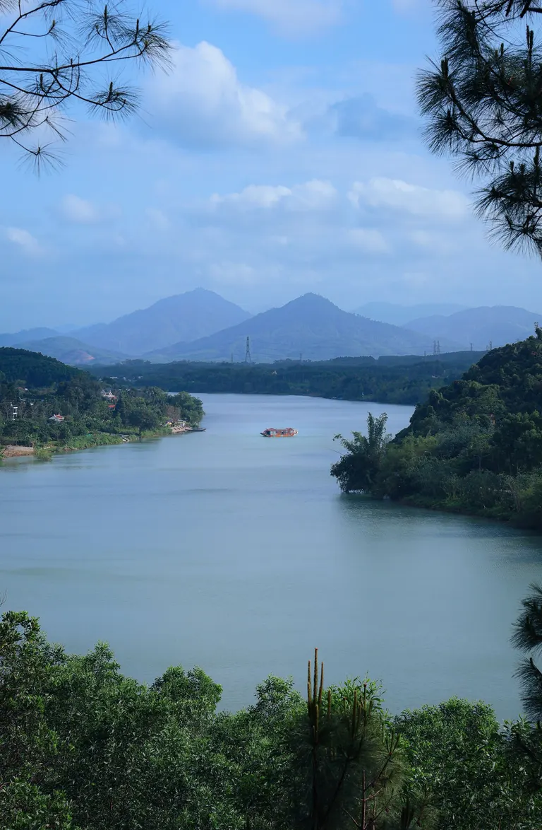 The Perfume River winding between green hills near Hue